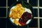 Plate of yogurt with cornflakes close-up above