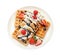 Plate with yummy waffles, whipped cream and berries on white background