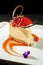 Plated cheesecake with vanilla panna cotta