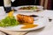 Plated Grilled Fish with Garnishes