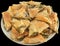 Plateful Of Freshly Oven Baked Serbian Traditional Cheese Spinach Pie Zeljanica Slices Isolated On Black Background