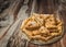 Plateful Of Lazy Apple Pie Slices Set On Old Cracked Flaky Rustic Wooden Garden Table