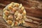 Plateful Of Oven Baked Lemon Chicken Meat With Seasoned Potato Halves Set On Old Weathered Cracked Flaky Garden Table