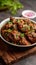 Plateful of spice Sukha mutton or chicken served with zest