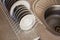 plates dry on an iron grate, against the background of an iron washbasin, in the kitchen