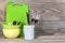 Plates, glass, forks, spoons after washing on wooden background