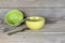 Plates, glass, forks, spoons after washing on wooden background