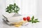 Plates and kitchen utensils on a white table