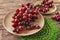 Plates with ripe grapes on wooden table