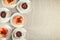 Plates with tasty tartlets on table, top view