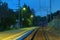 Platform of railway station and railroad at twilight