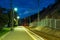 Platform of railway station and railroad at twilight