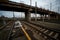 The platform of the railway station, trains, travel backpack is on the floor