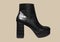 Platform women`s snakeskin boots