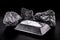 Platinum ingot and nugget, noble metal, used in the production of catalysts, luxury jewelry, isolated black background