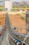 Platinum mining open pit with rocks being moved on a conveyor belt in South Africa