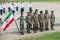 Platoon of soldiers of the Iranian army with the flag of the Islamic Republic of Iran
