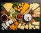 platter of cheese sliced different ways.