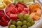 A Platter of Fruit Served in a White Plastic Tray