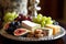 Platter of gourmet cheese and fruit pairing with figs, grapes, and artisanal cheeses