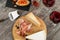 Platter with italian prosciutto crudo and cheese, glasses of red