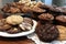 platter of mouthwatering cookies, brownies, and other baked goods