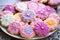 a platter of sugar cookies in various shapes and vibrant icing