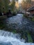 Plava Voda stream with cascades in Travnik in autumn during the evening