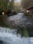 Plava Voda stream with cascades in Travnik in autumn during the evening