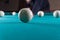 Play billiards. cue and billiard balls. hammer the ball into the hole