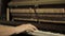 Play piano. Close up of female hands playing the piano. Fingers on the piano