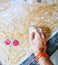 Play  time,  hand on carom board with selective focus.