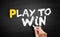 Play to Win text on blackboard