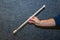 Play wooden sticks for drums