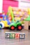 Play word from colorful cubes with many toys
