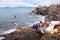 Playa Blanka, Lanzarote, Spain - 2072017:Unknown fishermen clean fish