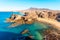 Playa de Papagayo Beach, desert landscape and blue sky. Lanzarote