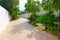 Playa del Carmen, Mexico - January 10, 2018: Outdoor view of a hall with stoned pavement and some public garden plants