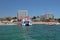 Playa den Bossa, Ibiza, Spain - Jul 5, 2017: Catamaran of boat party at ferry mooring
