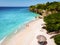 Playa Kalki Curacao tropical beach Caribbean sea, couple walking on the beach