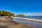 Playa Ocotal and Pacific ocean waves on rocky shore, El Coco Costa Rica