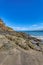 Playa Ocotal and Pacific ocean waves on rocky shore, El Coco Costa Rica