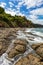 Playa Ocotal and Pacific ocean waves on rocky shore, El Coco Costa Rica