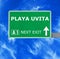 PLAYA UVITA road sign against clear blue sky