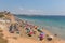 Playa Vistamar beach Mil Palmeras Costa Blanca Spain with people sunbathing on the beach