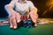 A player in a casino raises bets with chips, poker and a gaming business. The concept of a gaming business and online casino