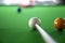 Player placing cue for shot snooker