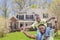 Playful African American Father and Son In Front of Home