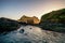 A playful baby seal is jumping in and out of water in New Zealand