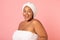 Playful Black Woman Posing With Moisturizer Dots On Face, Studio